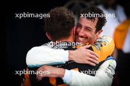 Race winner Lando Norris (GBR) McLaren celebrates in parc ferme with Daniel Ricciardo (AUS) RB. 05.05.2024. Formula 1 World Championship, Rd 6, Miami Grand Prix, Miami, Florida, USA, Race Day.