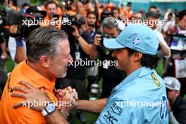 (L to R): Zak Brown (USA) McLaren Executive Director celebrates with Carlos Sainz Jr (ESP) Ferrari. 05.05.2024. Formula 1 World Championship, Rd 6, Miami Grand Prix, Miami, Florida, USA, Race Day.