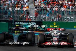 (L to R): Lewis Hamilton (GBR) Mercedes AMG F1 W15 and Nico Hulkenberg (GER) Haas VF-24 battle for position. 05.05.2024. Formula 1 World Championship, Rd 6, Miami Grand Prix, Miami, Florida, USA, Race Day.