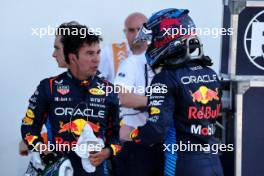 (L to R): Sergio Perez (MEX) Red Bull Racing with team mate Max Verstappen (NLD) Red Bull Racing in qualifying parc ferme. 04.05.2024. Formula 1 World Championship, Rd 6, Miami Grand Prix, Miami, Florida, USA, Sprint and Qualifying Day.