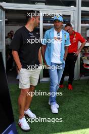 (L to R): Luis Suarez (URU) Inter Miami Football Player, with Carlos Sainz Jr (ESP) Ferrari. 02.05.2024. Formula 1 World Championship, Rd 6, Miami Grand Prix, Miami, Florida, USA, Preparation Day.