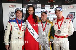22.02.2009 Johannesburg, South Africa,  Neel Jani (SUI), driver of A1 Team Switzerland with Miss Sout Africa, Felipe Guimaraes (BRA), driver of A1 Team Brazil and Clivio Piccione (MON) Driver of A1 Team Monaco - A1GP World Cup of Motorsport 2008/09, Round 5, Gauteng, Sunday Race 2 - Copyright A1GP - Free for editorial usage