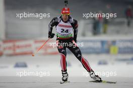 02.12.2010, Oestersund, Sweden (SWE): Arnd Peiffer (GER), Fischer, Salomon, Swix, adidas - IBU world cup biathlon, individual men, Oestersund (SWE). www.xpb.cc. © Manzoni/xpb.cc. Every downloaded picture is fee-liable.