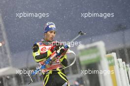 05.12.2010, Oestersund, Sweden (SWE): Martin Fourcade (FRA), Rossignol, Rottefella, Odlo - IBU world cup biathlon, pursuit men, Oestersund (SWE). www.xpb.cc. © Manzoni/xpb.cc. Every downloaded picture is fee-liable.