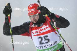 05.12.2010, Oestersund, Sweden (SWE): Alexander Wolf (GER), Fischer, Rottefella, Alpina, Leki adidas, Toko - IBU world cup biathlon, pursuit men, Oestersund (SWE). www.xpb.cc. © Manzoni/xpb.cc. Every downloaded picture is fee-liable.