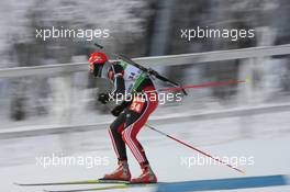 04.12.2010, Oestersund, Sweden (SWE): Alexander Wolf (GER), Fischer, Rottefella, Alpina, Leki adidas, Toko - IBU world cup biathlon, sprint men, Oestersund (SWE). www.xpb.cc. © Manzoni/xpb.cc. Every downloaded picture is fee-liable.