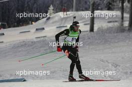 04.12.2010, Oestersund, Sweden (SWE): Simon Hallenbarter (SUI), Madshus, Rottefella, KV+, ODLO - IBU world cup biathlon, sprint men, Oestersund (SWE). www.xpb.cc. © Manzoni/xpb.cc. Every downloaded picture is fee-liable.