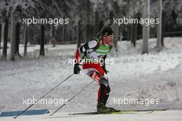 04.12.2010, Oestersund, Sweden (SWE): Simon Eder (AUT), Fischer, Rottefella, Swix - IBU world cup biathlon, sprint men, Oestersund (SWE). www.xpb.cc. © Manzoni/xpb.cc. Every downloaded picture is fee-liable.