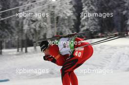04.12.2010, Oestersund, Sweden (SWE): Lars Berger (NOR), Madshus, Salomon, Swix, Odlo - IBU world cup biathlon, sprint men, Oestersund (SWE). www.xpb.cc. © Manzoni/xpb.cc. Every downloaded picture is fee-liable.