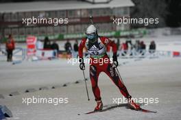 03.12.2010, Oestersund, Sweden (SWE): Ann Kristin Flatland (NOR), Madshus, Rottefella, Alpina, Swix, ODLO - IBU world cup biathlon, sprint women, Oestersund (SWE). www.xpb.cc. © Manzoni/xpb.cc. Every downloaded picture is fee-liable.