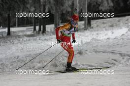 03.12.2010, Oestersund, Sweden (SWE): Jialin Tang (CHN), Fischer, Salomon, Swix, adidas - IBU world cup biathlon, sprint women, Oestersund (SWE). www.xpb.cc. © Manzoni/xpb.cc. Every downloaded picture is fee-liable.