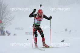 12.12.2010, Hochfilzen, Austria (AUT): Simon Schempp (GER), Fischer, Rottefella, Alpina, Leki, adidas  - IBU world cup biathlon, relay men, Hochfilzen (AUT). www.xpb.cc. © Manzoni/xpb.cc. Every downloaded picture is fee-liable.