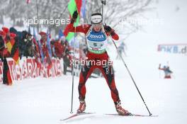 11.12.2010, Hochfilzen, Austria (AUT): Ann Kristin Flatland (NOR), Madshus, Rottefella, Alpina, Swix, ODLO - IBU world cup biathlon, relay women, Hochfilzen (AUT). www.xpb.cc. © Manzoni/xpb.cc. Every downloaded picture is fee-liable.