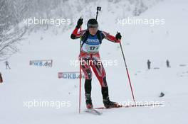 11.12.2010, Hochfilzen, Austria (AUT): Zina Kocher (CAN), Atomic, Leki, Odlo - IBU world cup biathlon, relay women, Hochfilzen (AUT). www.xpb.cc. © Manzoni/xpb.cc. Every downloaded picture is fee-liable.