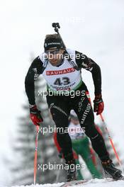 10.12.2010, Hochfilzen, Austria (AUT): Matthias Simmen (SUI), Rossignol, Rottefella, Exel, ODLO - IBU world cup biathlon, sprint men, Hochfilzen (AUT). www.xpb.cc. © Manzoni/xpb.cc. Every downloaded picture is fee-liable.