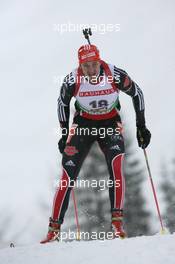 10.12.2010, Hochfilzen, Austria (AUT): Alexander Wolf (GER), Fischer, Rottefella, Alpina, Leki adidas, Toko - IBU world cup biathlon, sprint men, Hochfilzen (AUT). www.xpb.cc. © Manzoni/xpb.cc. Every downloaded picture is fee-liable.