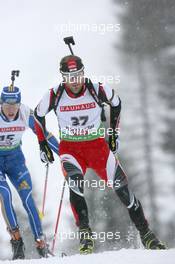 10.12.2010, Hochfilzen, Austria (AUT): Daniel Mesotitsch (AUT), Fischer, Rottefella, Leki - IBU world cup biathlon, sprint men, Hochfilzen (AUT). www.xpb.cc. © Manzoni/xpb.cc. Every downloaded picture is fee-liable.