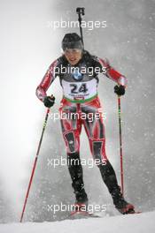 10.12.2010, Hochfilzen, Austria (AUT): Zina Kocher (CAN), Atomic, Leki, Odlo - IBU world cup biathlon, sprint women, Hochfilzen (AUT). www.xpb.cc. © Manzoni/xpb.cc. Every downloaded picture is fee-liable.