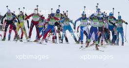 19.12.2010, Pokljuka, Slovenia (SLO): Start of the mixed relay - IBU world cup biathlon, relay mixed, Pokljuka (SLO). www.xpb.cc. © Miko/xpb.cc. Every downloaded picture is fee-liable.