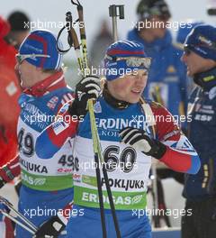 18.12.2010, Pokljuka, Slovenia (SLO): Maxim Tchoudov (RUS), Fischer, Salomon, adidas - IBU world cup biathlon, sprint men, Pokljuka (SLO). www.xpb.cc. © Miko/xpb.cc. Every downloaded picture is fee-liable.