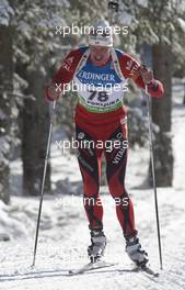 18.12.2010, Pokljuka, Slovenia (SLO): Lars Berger (NOR), Madshus, Salomon, Swix, Odlo - IBU world cup biathlon, sprint men, Pokljuka (SLO). www.xpb.cc. © Miko/xpb.cc. Every downloaded picture is fee-liable.