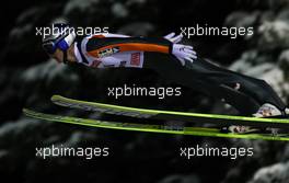 01.12.2010, Kuopio, Finland (FIN): Thomas Morgenstern (AUT), Fischer  - FIS world cup ski jumping, individual HS127, Kuopio (FIN). www.xpb.cc. © Laiho/xpb.cc. Every downloaded picture is fee-liable.