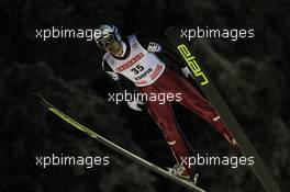 01.12.2010, Kuopio, Finland (FIN): Wolfgang Loitzl (AUT), Elan  - FIS world cup ski jumping, individual HS127, Kuopio (FIN). www.xpb.cc. © Laiho/xpb.cc. Every downloaded picture is fee-liable.