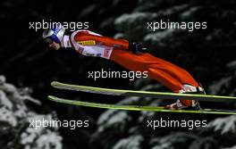 01.12.2010, Kuopio, Finland (FIN):  Adam Malysz (POL), Fischer - FIS world cup ski jumping, individual HS127, Kuopio (FIN). www.xpb.cc. © Laiho/xpb.cc. Every downloaded picture is fee-liable.