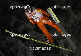 01.12.2010, Kuopio, Finland (FIN): Adam Malysz (POL), Fischer  - FIS world cup ski jumping, individual HS127, Kuopio (FIN). www.xpb.cc. © Laiho/xpb.cc. Every downloaded picture is fee-liable.