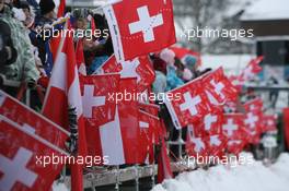 18.12.2010, Engelberg, Switzerland (SUI): Fans with swiss flags - FIS world cup ski jumping, individual HS137, Engelberg (SUI). www.xpb.cc. © Manzoni/xpb.cc. Every downloaded picture is fee-liable.