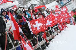 18.12.2010, Engelberg, Switzerland (SUI): Fans with swiss flags - FIS world cup ski jumping, individual HS137, Engelberg (SUI). www.xpb.cc. © Manzoni/xpb.cc. Every downloaded picture is fee-liable.