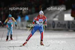 09.01.2011, Oberhof, Germany (GER): Anna Bogaly-Titovets (RUS), Fischer, Rottefella, Alpina, OneWay, adidas - IBU world cup biathlon, mass women, Oberhof (GER). www.xpb.cc. © Manzoni/xpb.cc. Every downloaded picture is fee-liable.
