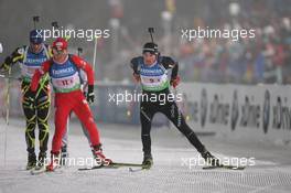 05.01.2011, Oberhof, Germany (GER): Vincent Jay (FRA), Fischer, Rottefella, OneWay, Ivan Joller (SUI), Fischer, Rottefella, Leki, ODLO - IBU world cup biathlon, relay men, Oberhof (GER). www.xpb.cc. © Manzoni/xpb.cc. Every downloaded picture is fee-liable.