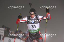 07.01.2011, Oberhof, Germany (GER): Lukas Szczurek (POL), Salomon, Leki  - IBU world cup biathlon, sprint men, Oberhof (GER). www.xpb.cc. © Manzoni/xpb.cc. Every downloaded picture is fee-liable.