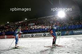 08.01.2011, Oberhof, Germany (GER): Michaela Ponza (ITA), Fischer, Rottefella, Rossignol, Swix, Natalia Guseva (RUS), Atomic, KV+, adidas - IBU world cup biathlon, sprint women, Oberhof (GER). www.xpb.cc. © Manzoni/xpb.cc. Every downloaded picture is fee-liable.