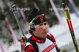 12.01.2011, Ruhpolding, Germany (GER): Brendan Green (CAN), Madshus, Rottefella, Leki - IBU world cup biathlon, individual men, Ruhpolding (GER). www.xpb.cc. © Manzoni/xpb.cc. Every downloaded picture is fee-liable.