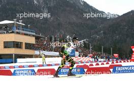 12.01.2011, Ruhpolding, Germany (GER): Simon Fourcade (FRA), Fischer, Rottefella, Rossignol, Swix, Odlo - IBU world cup biathlon, individual men, Ruhpolding (GER). www.xpb.cc. © Manzoni/xpb.cc. Every downloaded picture is fee-liable.