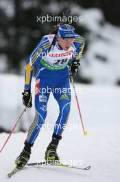 12.01.2011, Ruhpolding, Germany (GER): Bjoern Ferry (SWE), Fischer, Rottefella, Leki, adidas - IBU world cup biathlon, individual men, Ruhpolding (GER). www.xpb.cc. © Manzoni/xpb.cc. Every downloaded picture is fee-liable.