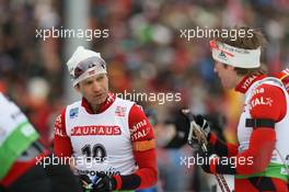 12.01.2011, Ruhpolding, Germany (GER): Ole Einar Bjoerndalen (NOR), Madshus, Rottefella, Odlo, Emil Hegle Svendsen (NOR), Madshus, Rottefella, Swix, Odlo - IBU world cup biathlon, individual men, Ruhpolding (GER). www.xpb.cc. © Manzoni/xpb.cc. Every downloaded picture is fee-liable.