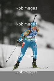 13.01.2011, Ruhpolding, Germany (GER): Irina Mozhevitina (KAZ), Fischer, Rottefella, Swix - IBU world cup biathlon, individual women, Ruhpolding (GER). www.xpb.cc. © Manzoni/xpb.cc. Every downloaded picture is fee-liable.
