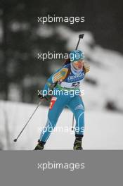13.01.2011, Ruhpolding, Germany (GER): Irina Mozhevitina (KAZ), Fischer, Rottefella, Swix - IBU world cup biathlon, individual women, Ruhpolding (GER). www.xpb.cc. © Manzoni/xpb.cc. Every downloaded picture is fee-liable.