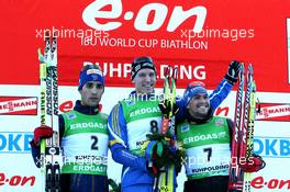 16.01.2011, Ruhpolding, Germany (GER): (L-R) Martin Fourcade (FRA), Rossignol, Rottefella, OneWay, Odlo, Bjoern Ferry (SWE), Fischer, Rottefella, Leki, adidas, Michael Greis (GER), Madshus, Rottefella, OneWay, adidas - IBU world cup biathlon, pursuit men, Ruhpolding (GER). www.xpb.cc. © Manzoni/xpb.cc. Every downloaded picture is fee-liable.