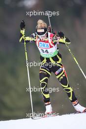 15.01.2011, Ruhpolding, Germany (GER): Marie Dorin (FRA), Rossignol, Rottefella, OneWay - IBU world cup biathlon, sprint women, Ruhpolding (GER). www.xpb.cc. © Manzoni/xpb.cc. Every downloaded picture is fee-liable.