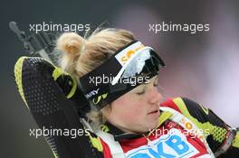 15.01.2011, Ruhpolding, Germany (GER): Marie Dorin (FRA), Rossignol, Rottefella, OneWay - IBU world cup biathlon, sprint women, Ruhpolding (GER). www.xpb.cc. © Manzoni/xpb.cc. Every downloaded picture is fee-liable.