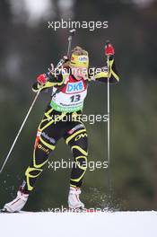 15.01.2011, Ruhpolding, Germany (GER): Anais Bescond (FRA), Madshus, Rottefella, Swix, OneWay - IBU world cup biathlon, sprint women, Ruhpolding (GER). www.xpb.cc. © Manzoni/xpb.cc. Every downloaded picture is fee-liable.