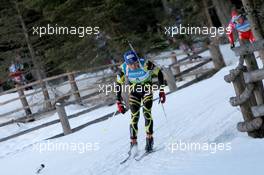 22.01.2011, Antholz, Italy (ITA): Martin Fourcade (FRA), Rossignol, Rottefella, OneWay, Odlo - IBU world cup biathlon, mass men, Antholz (ITA). www.xpb.cc. © Manzoni/xpb.cc. Every downloaded picture is fee-liable.