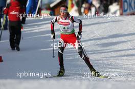 23.01.2011, Antholz, Italy (ITA): Tobias Eberhard (AUT), Fischer, Rottefella, Swix - IBU world cup biathlon, relay men, Antholz (ITA). www.xpb.cc. © Manzoni/xpb.cc. Every downloaded picture is fee-liable.