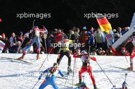 22.01.2011, Antholz, Italy (ITA): Svetlana Sleptsova (RUS), Fischer, Rottefella, Alpina, Swix, adidas, leads Jana Gerekova (SVK), Fischer, Salomon - IBU world cup biathlon, relay women, Antholz (ITA). www.xpb.cc. © Manzoni/xpb.cc. Every downloaded picture is fee-liable.