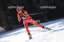 22.01.2011, Antholz, Italy (ITA): Jialin Tang (CHN), Fischer, Salomon, Swix, adidas - IBU world cup biathlon, relay women, Antholz (ITA). www.xpb.cc. © Manzoni/xpb.cc. Every downloaded picture is fee-liable.