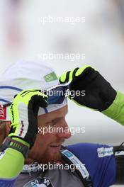 20.01.2011, Antholz, Italy (ITA): Klemen Bauer (SLO), Fischer, Rottefella, Alpina, Swix - IBU world cup biathlon, sprint men, Antholz (ITA). www.xpb.cc. © Manzoni/xpb.cc. Every downloaded picture is fee-liable.